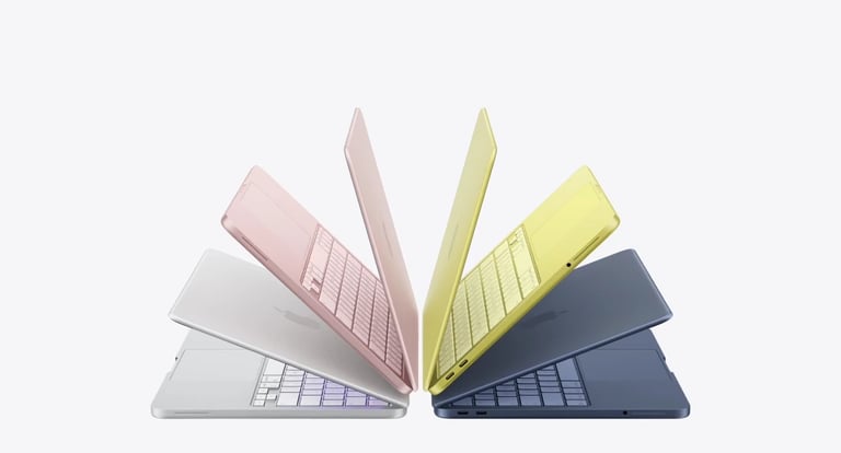 Varios MacBook Neo de Apple en colores pastel abiertos en abanico sobre fondo degradado, mostrando el diseño colorido del portátil de 599 dólares con chip A18 Pro